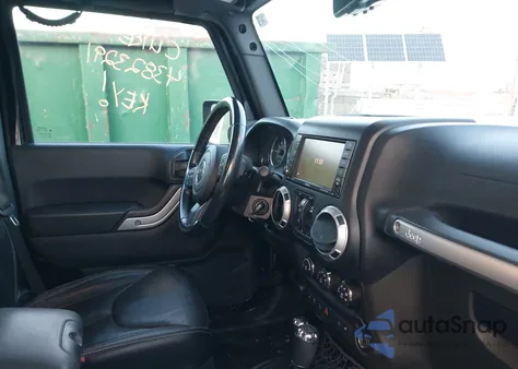 2015 Jeep Wrangler Unlimited Sahara z USA, uszkodzony, nr VIN 1C4BJWEG4FL627080